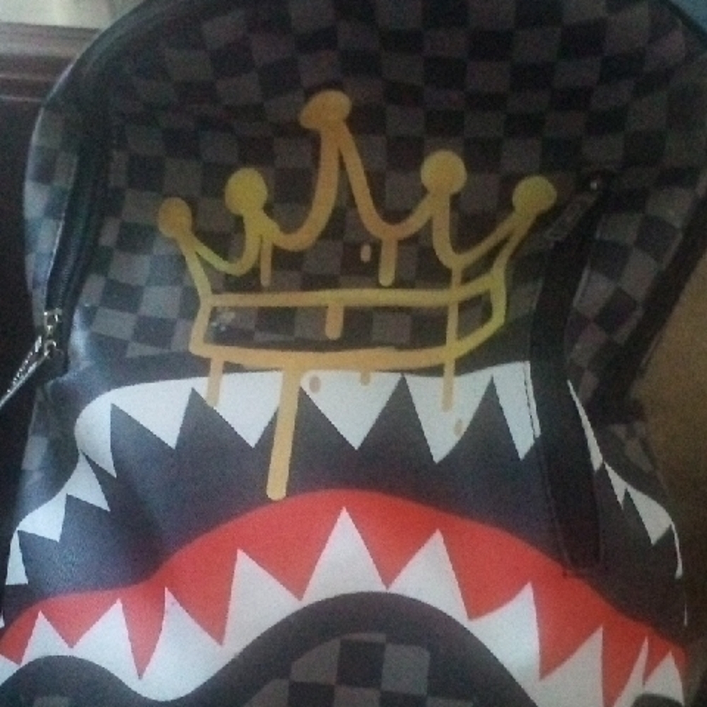 Checkered Backpack with Crown and Shark Design